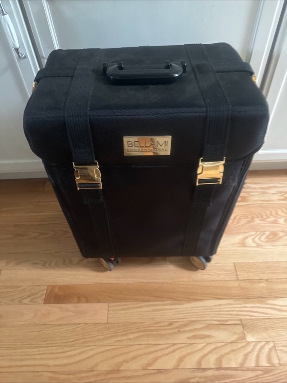 BELLAMI Black Rolling Makeup Case with Gold Hardware